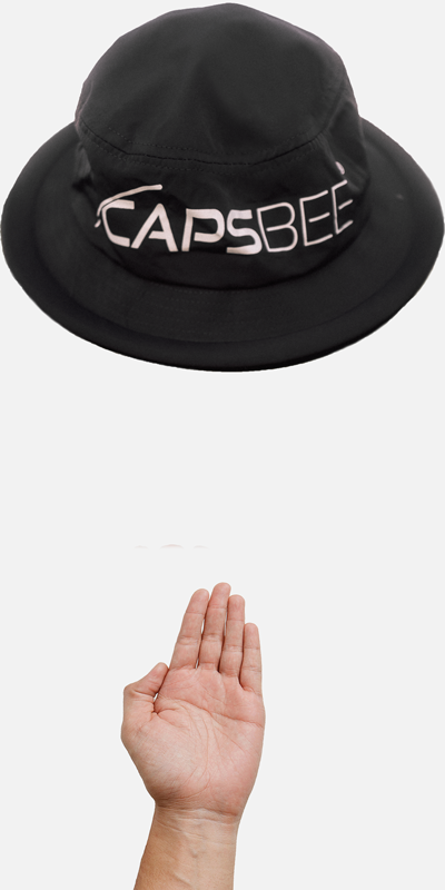 Hand mit Capsbee